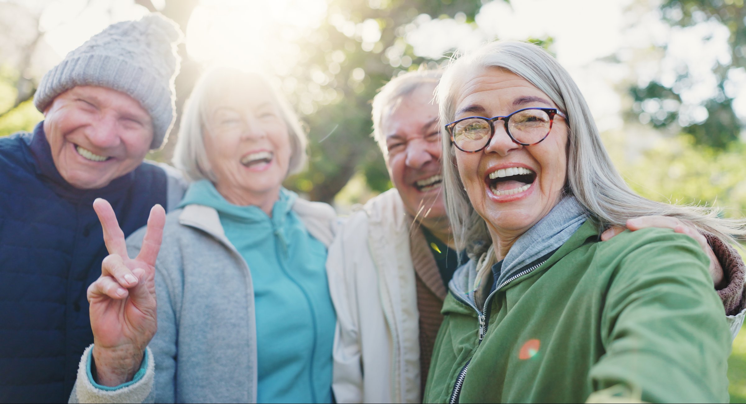 Peace sign selfie, face and senior happy friends bond together with reunion memory photo of old woman, man or club. Morning freedom, nature portrait or relax elderly group for winter profile picture