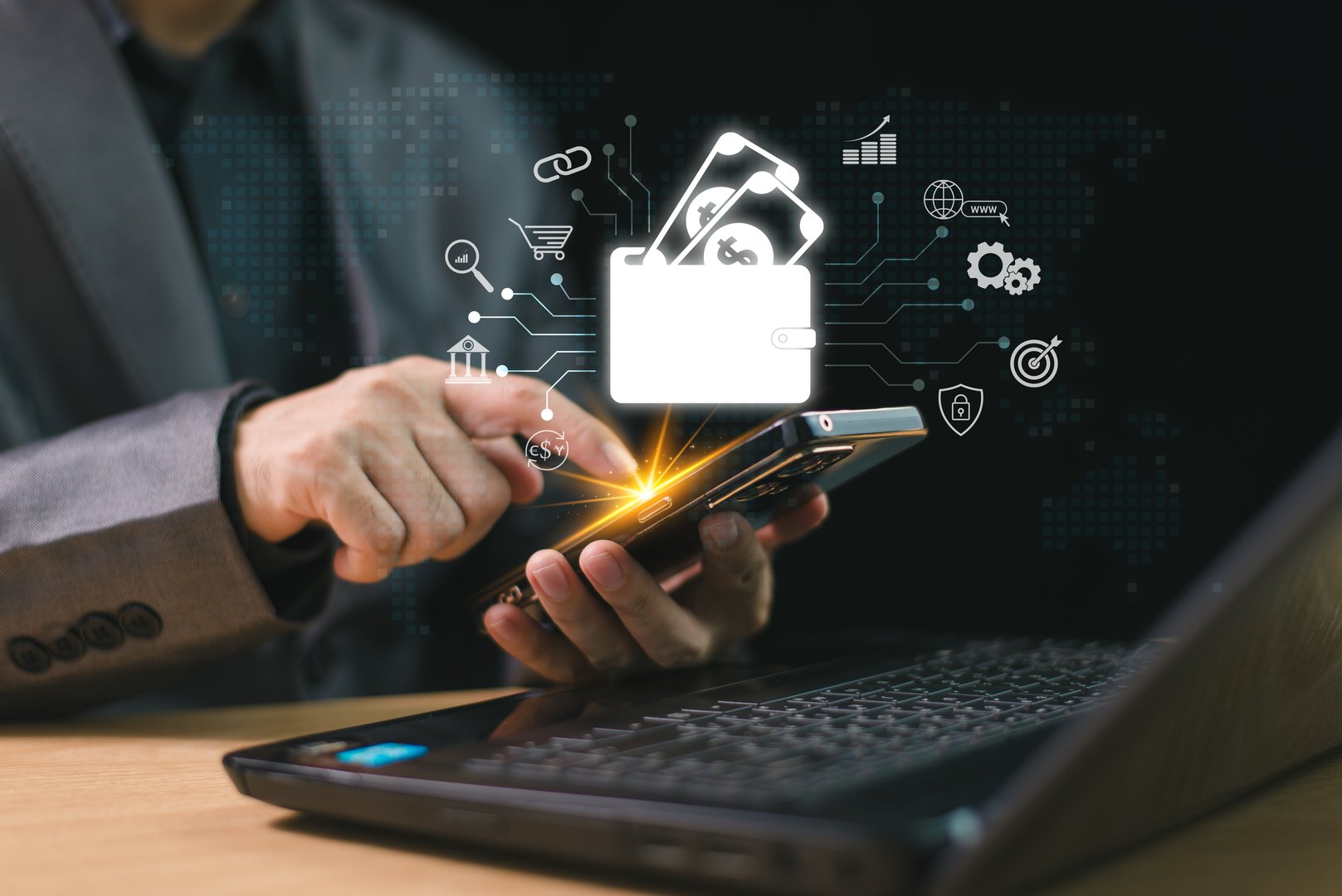 Digital wallet payment icon on internet mobile banking, online wallet business concept. Man hold smartphone and computer laptop with online money transaction application. Bank e-commerce investment