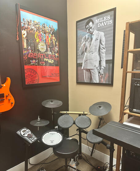 Student playing electric guitar