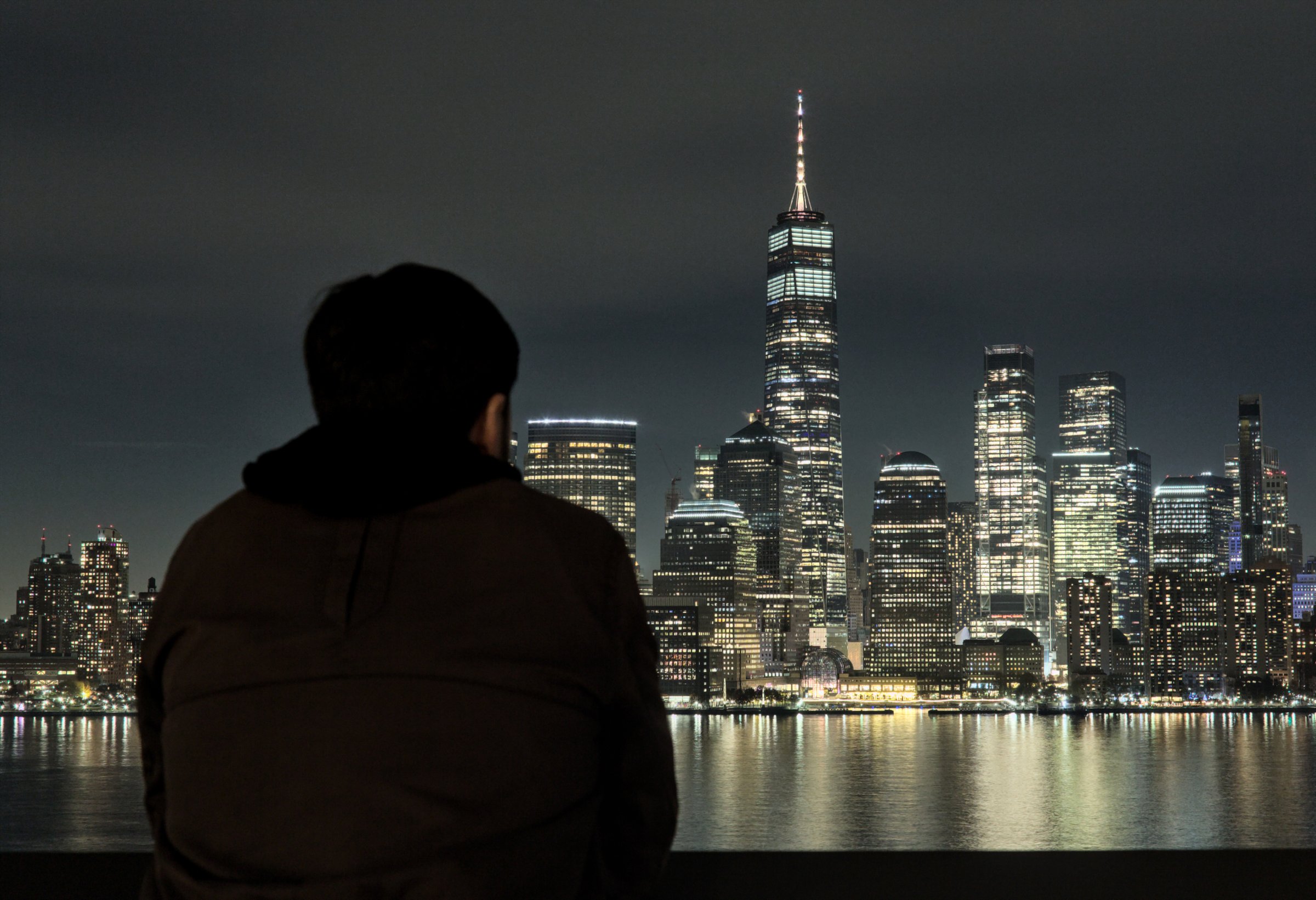 Man looking at city skyline