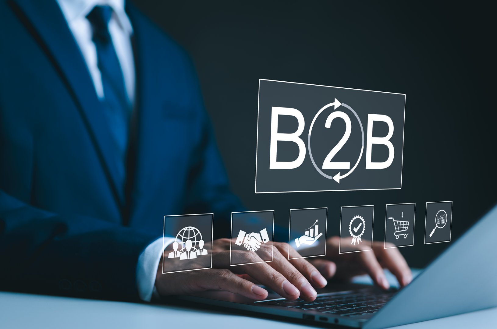 B2B business strategy concept. Businessman working with B2B virtual on laptop, conceptualizing strategy, partnership, targets in business to business services. E-commerce, B2B Marketing, enterprise,