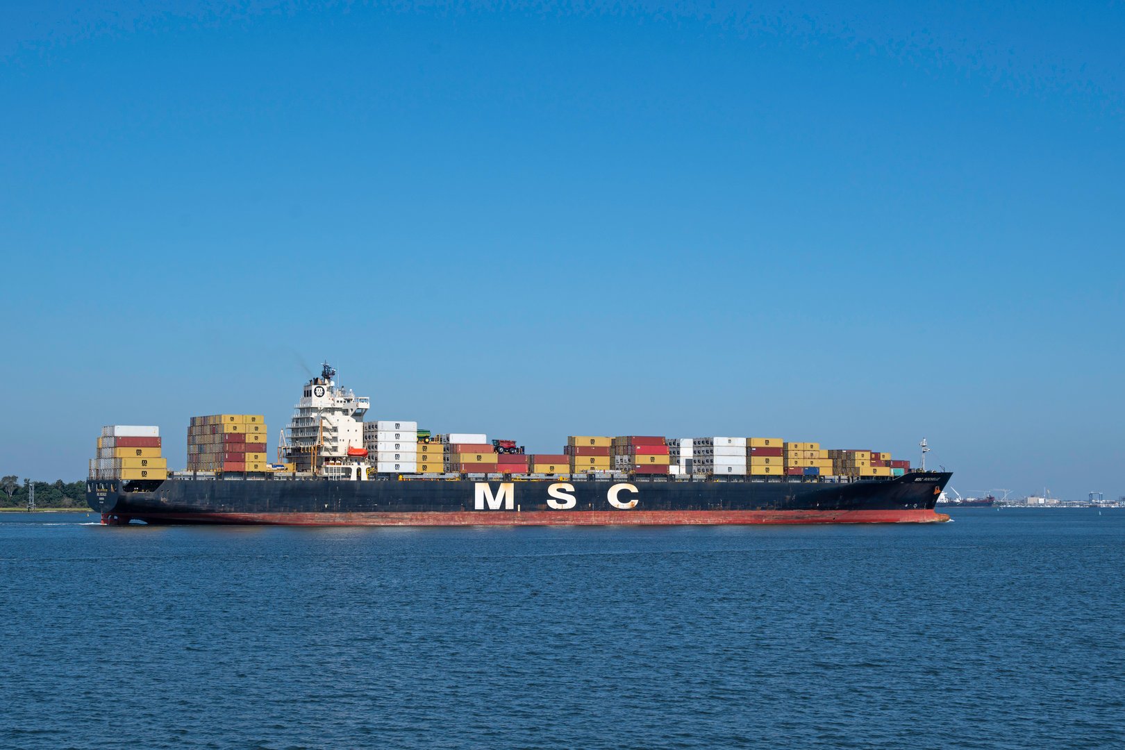Charleston, SC, USA - September 16, 2025: MSC Rochelle, a 293-meter Panamax-class container ship owned by Mediterranean Shipping Company and flagged to Liberia, sails into Charleston Harbor.