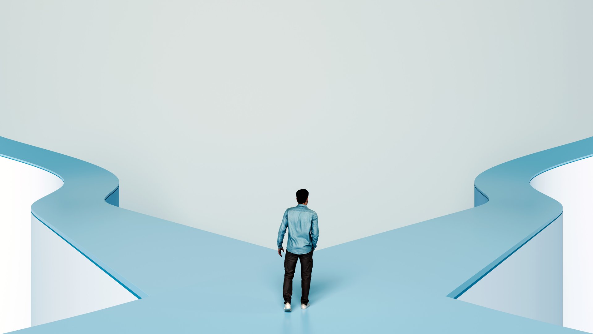 Man at fork in the road representing decision-making and life choices