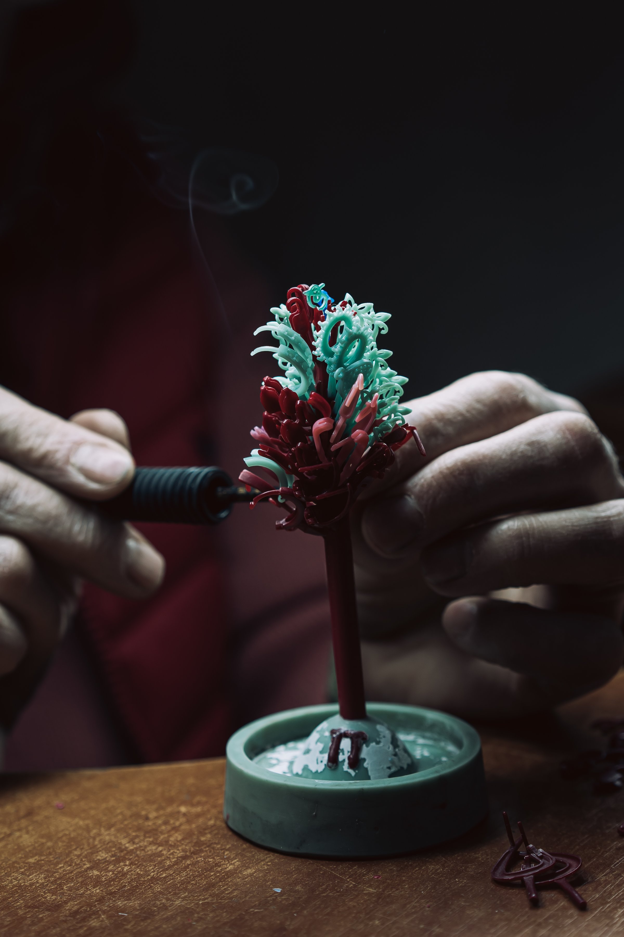 Making wax tree jewelry befor casting,process of making jewelry. Close up photo of hand and processing