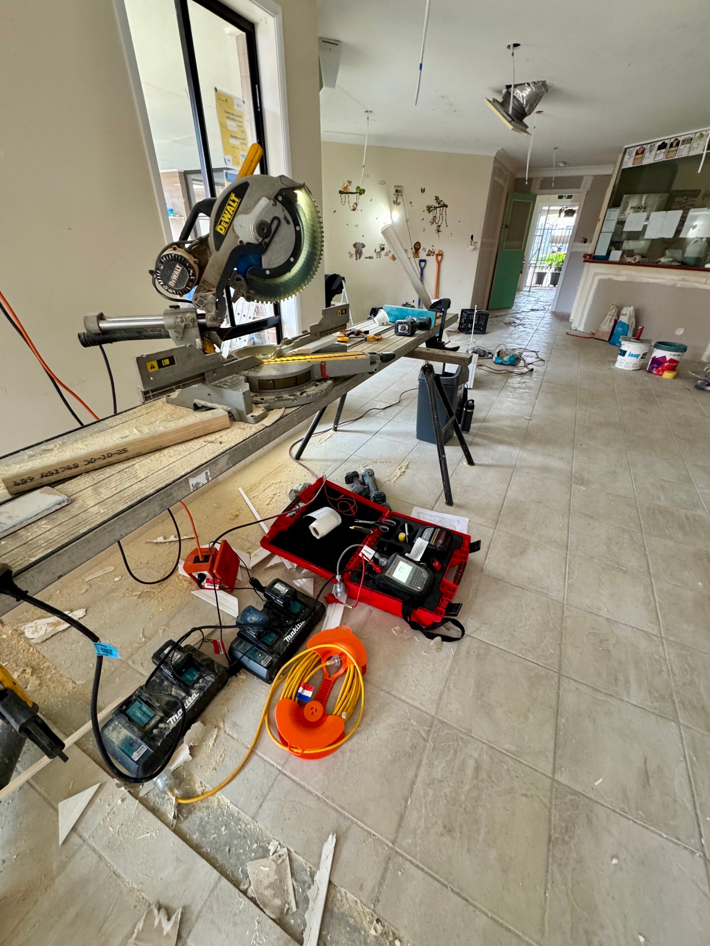 mobile test and tag technician arriving at commercial site