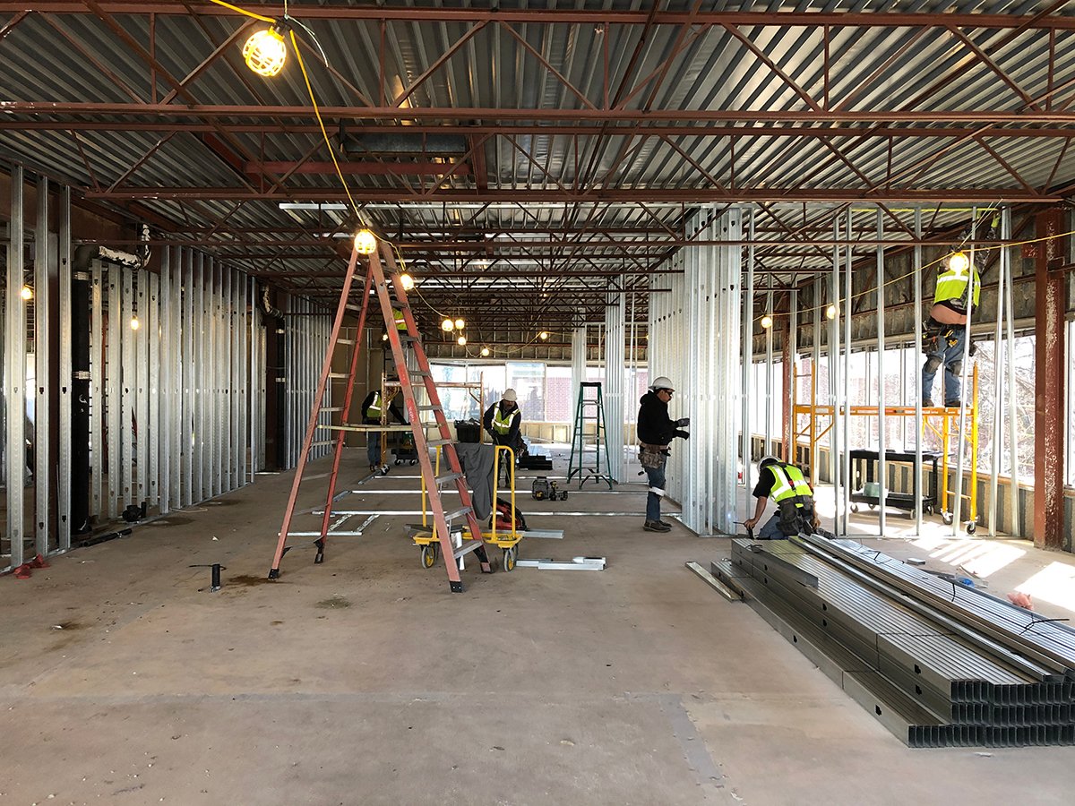 Construction site with workers and equipment