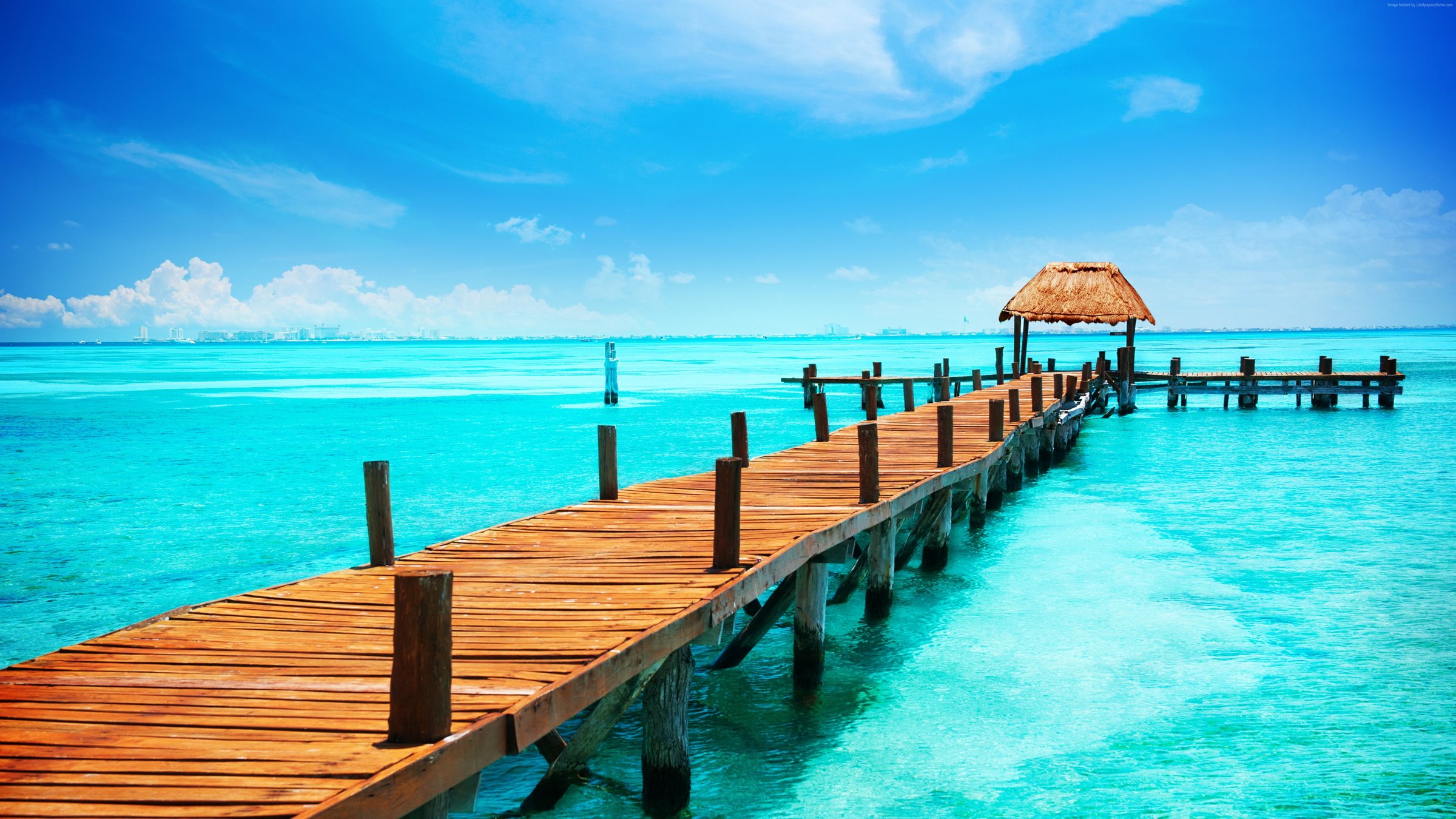 Isla Mujeres is an island where the Gulf of Mexico and the Caribbean Sea meet. It  is a slice of paradise a short distance off the coast of Cancun. It offers tropical isolation away from the busy town and resorts, with incredible views of the surrounding Caribbean.