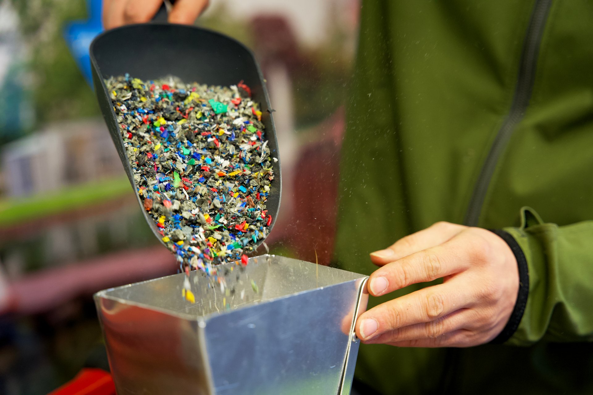 Plastic granulates in a hand