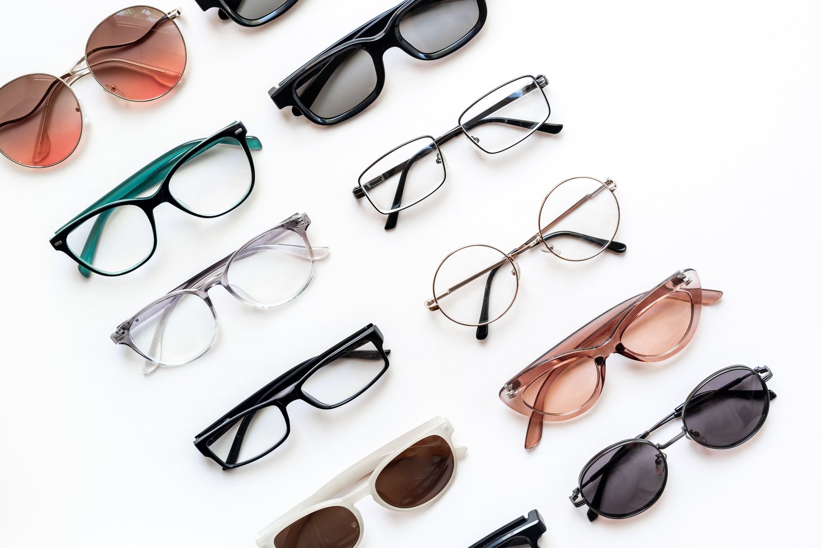 Group of glasses. Fashionable assortment of glasses in various styles and colors