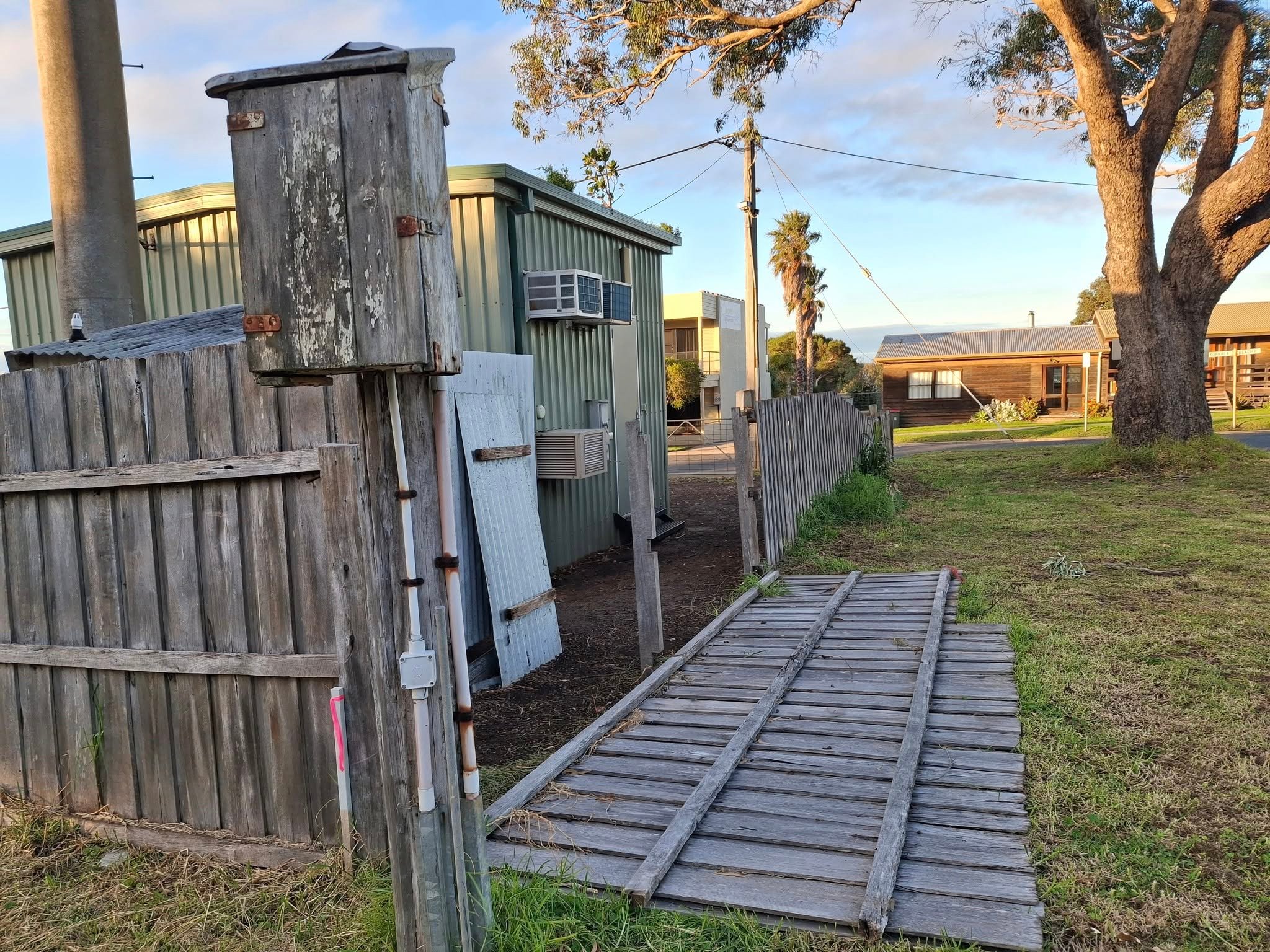 Before - Old damaged fence needing repair