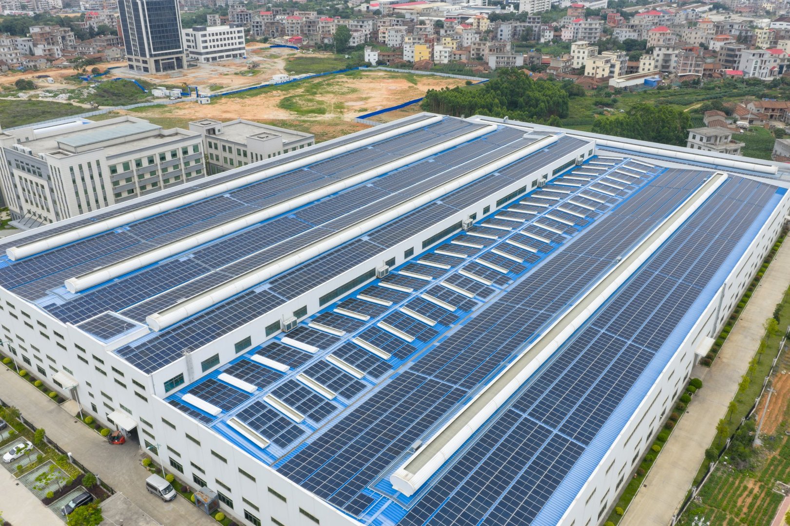 Green power plant, solar photovoltaic power generation on the factory roof