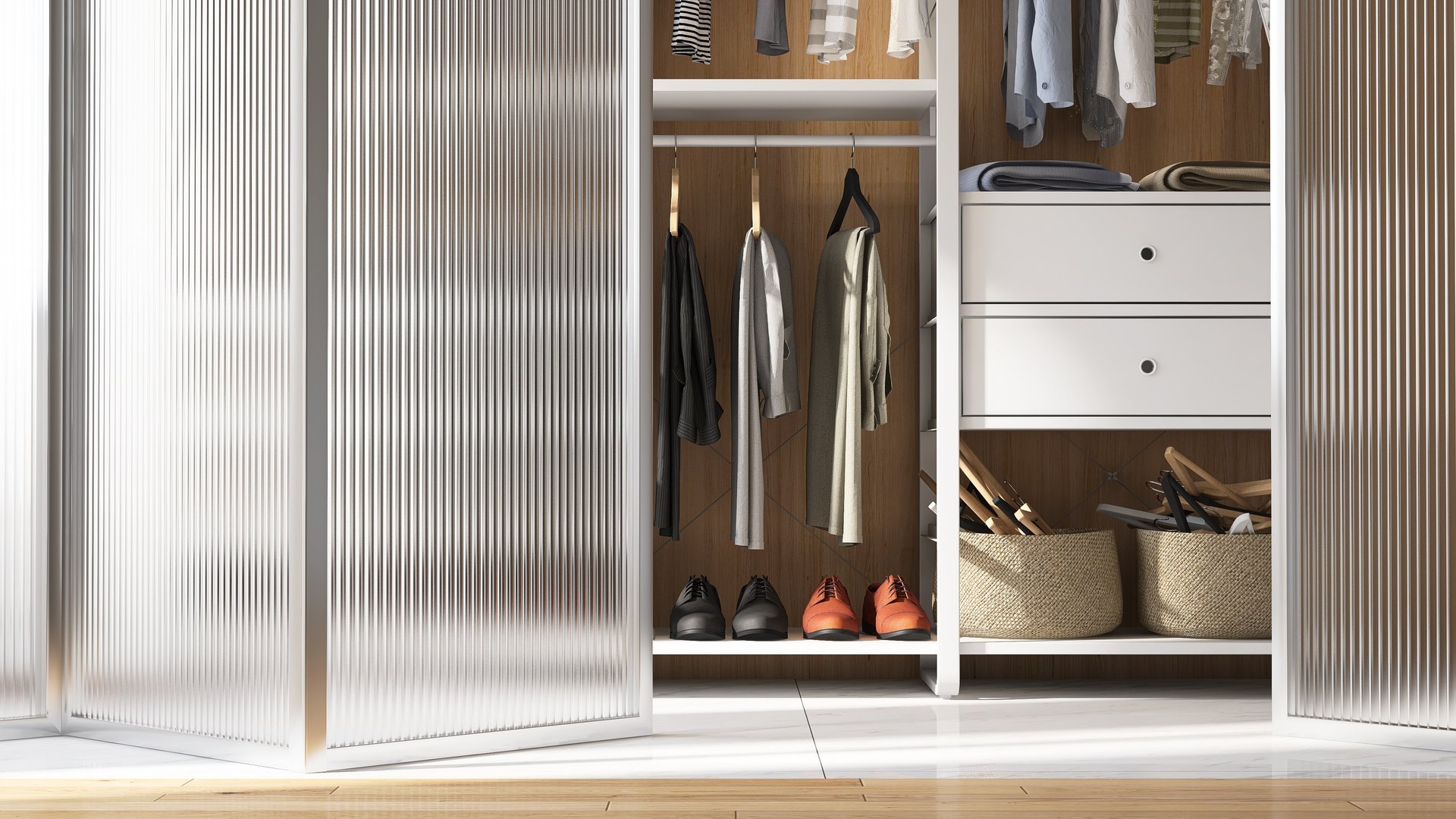 Front view of modern and elegant design of walk in closet with neat , adjustable and organized shelf and man's luxury clothes, shirt and leather shoes, and folding reeded acrylic glass door with stainless steel frame