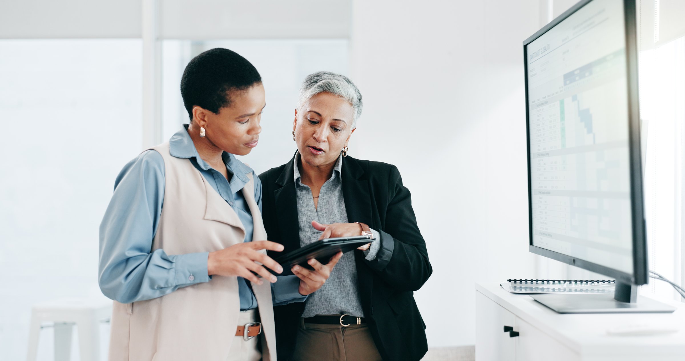 Women, team and computer screen or tablet for spreadsheet, business calendar or project timeline management. Professional manager or people on digital technology for marketing strategy and solution