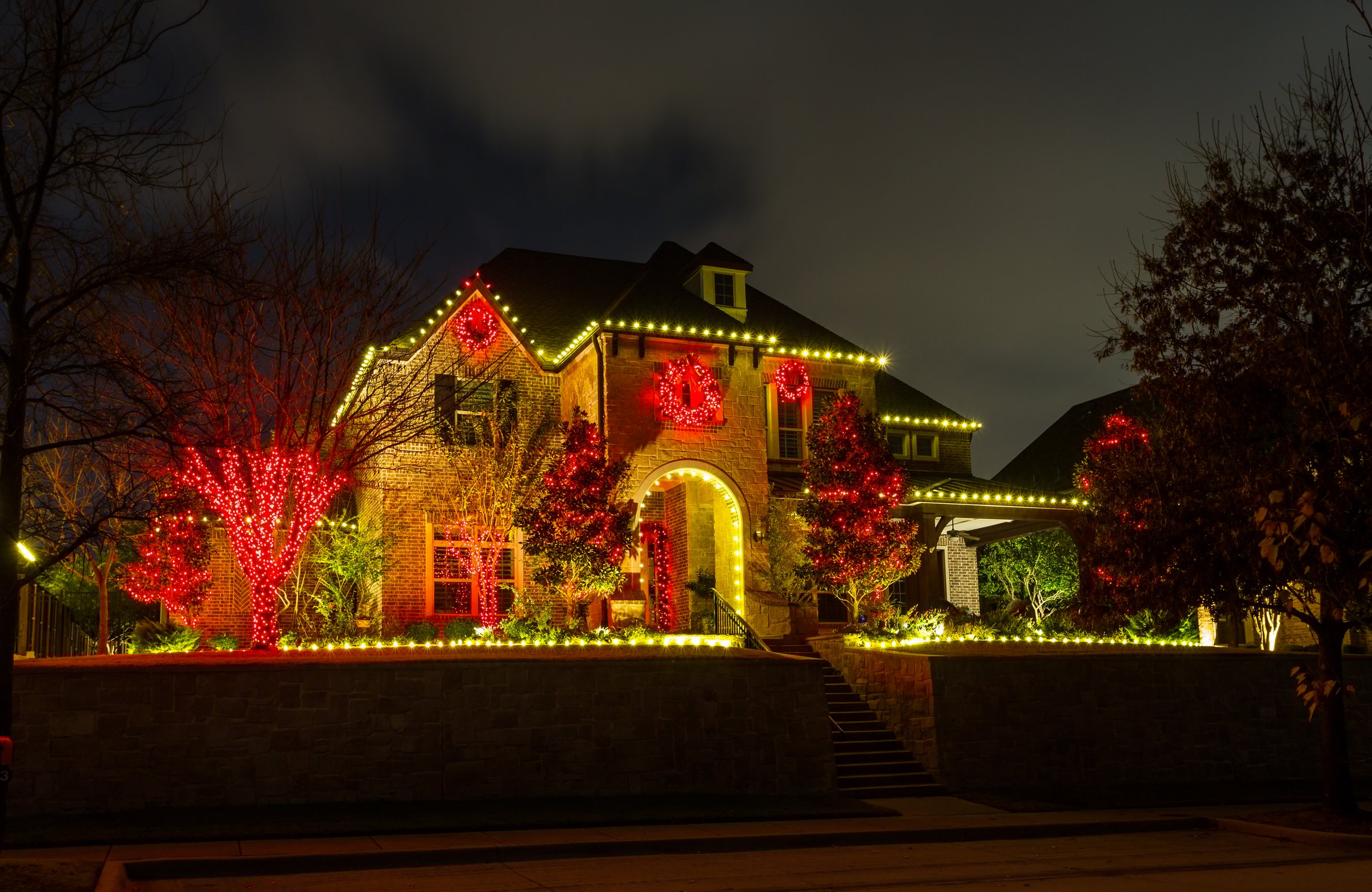 Plano, Texas, USA - December 16th, 2021: Private residence house decorated and illuminated for Christmas
