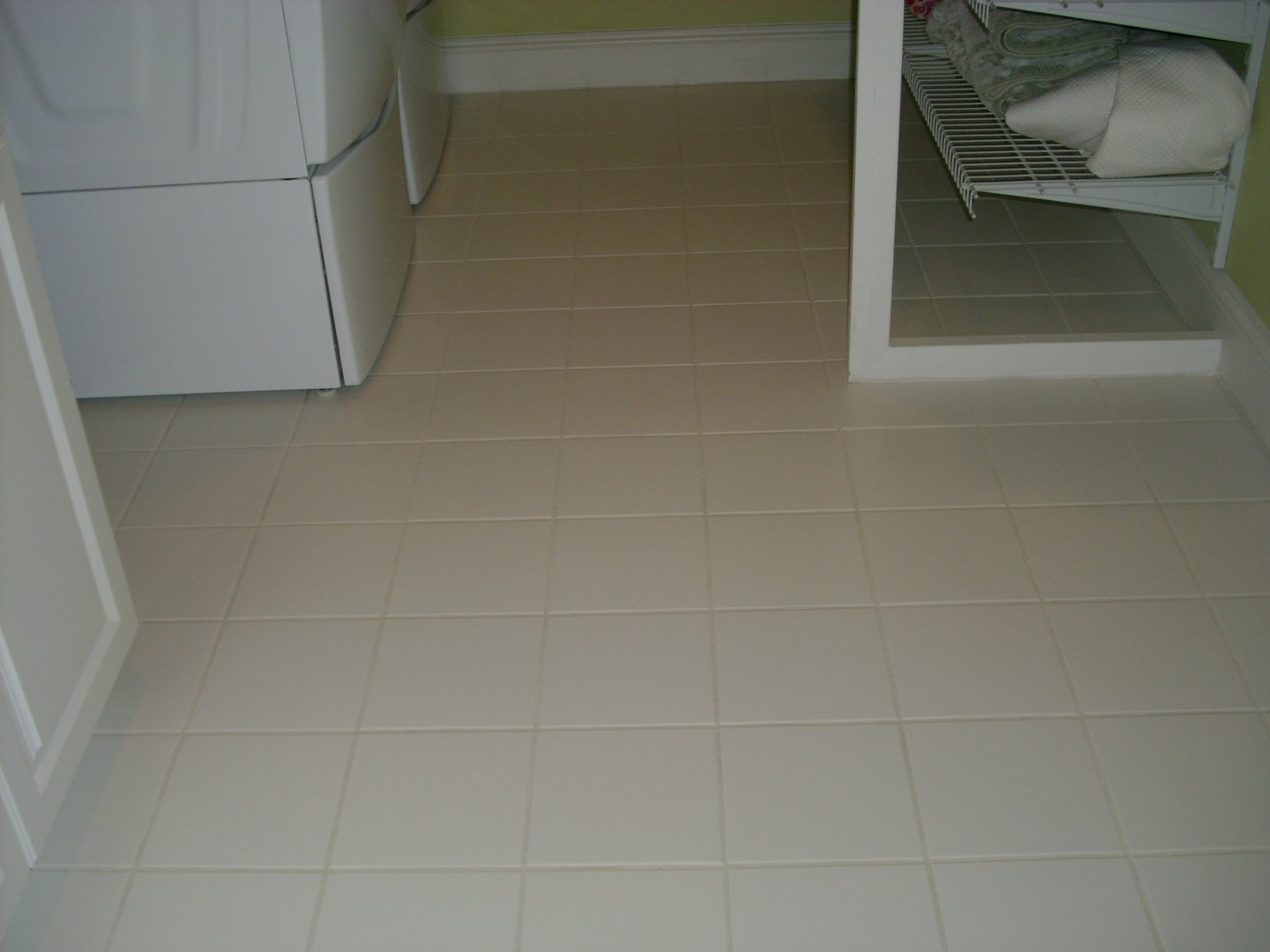 White ceramic tiles after grout restoration