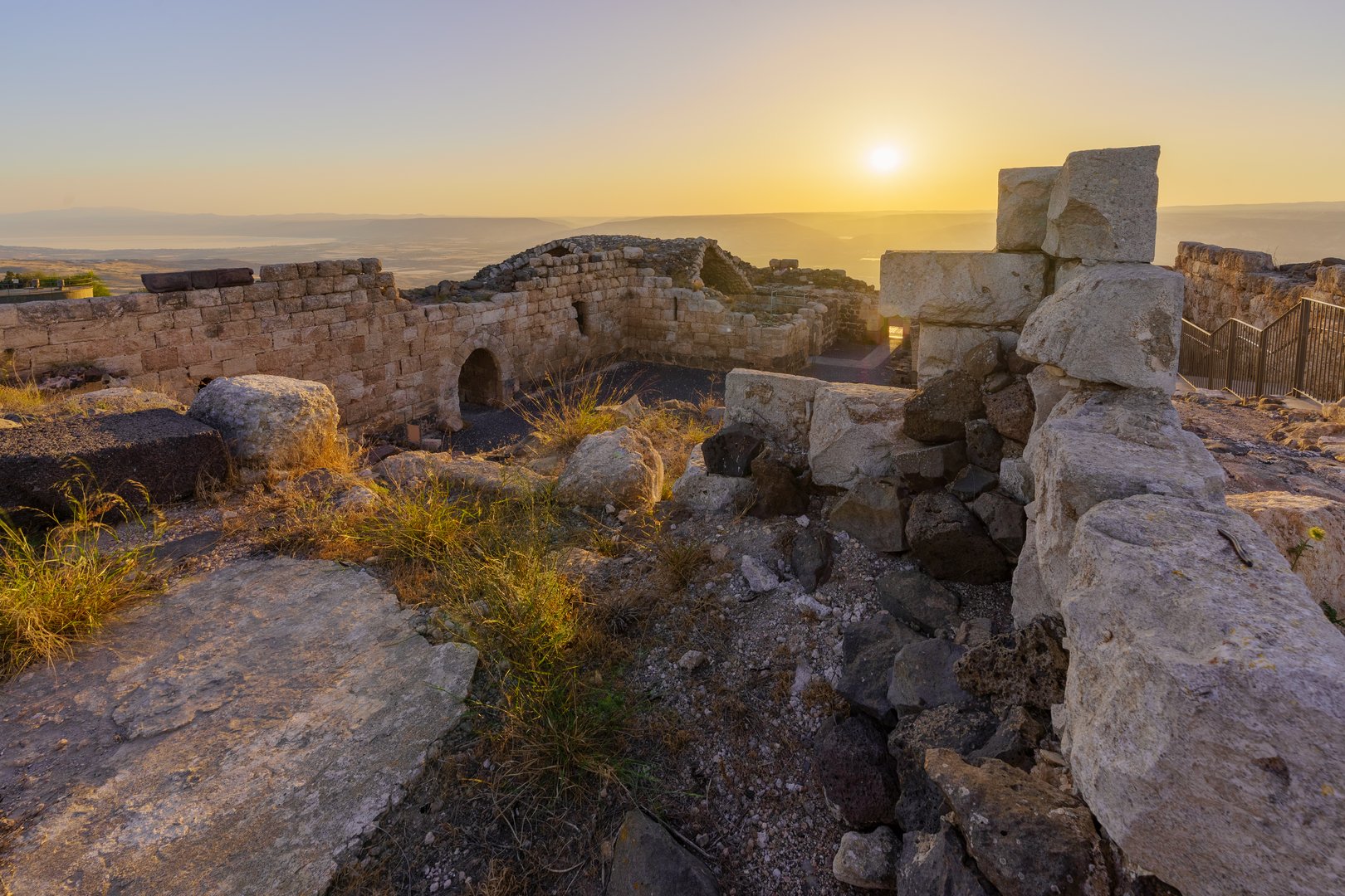 Sunrise view of the ruins of the crusader Belvoir Fortress (Kochav HaYarden, Jordan Star), now a national park, with the Jordan Valley landscape and the Sea of Galilee. Northern Israel