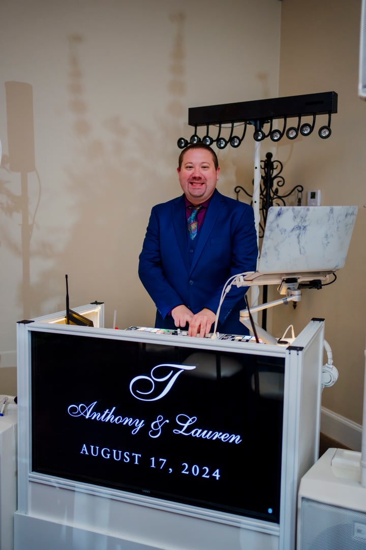 DJ Jimmy's typical wedding DJ setup with professional equipment and lighting