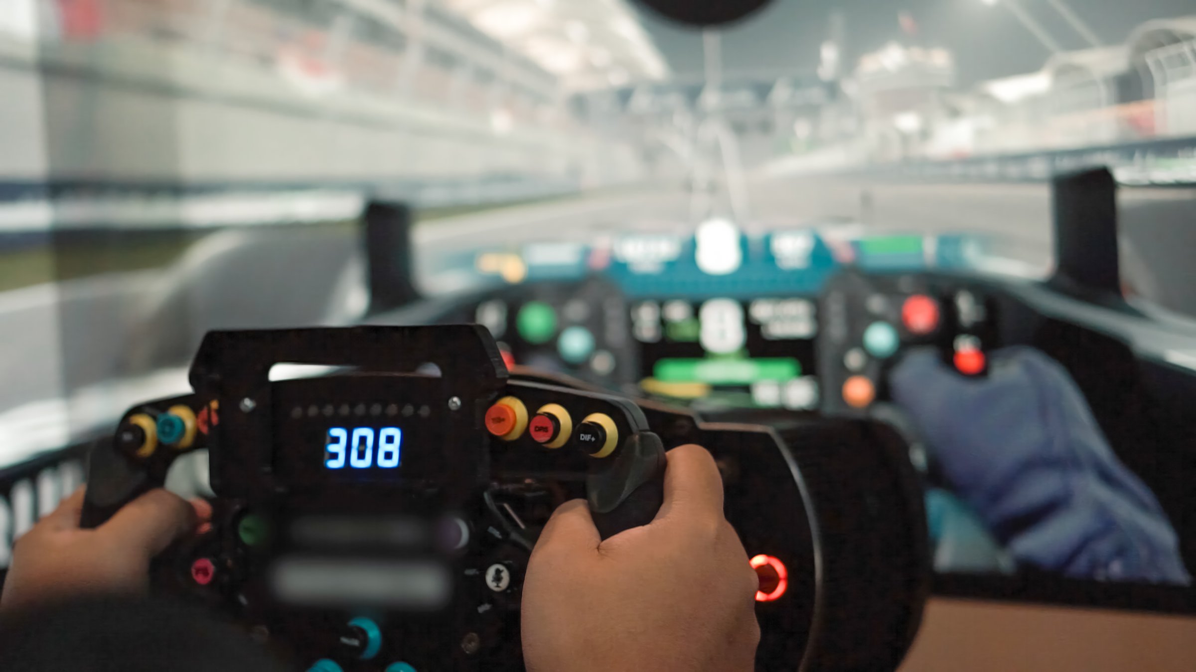 Close up hand Young asian man playingCar racing video game.