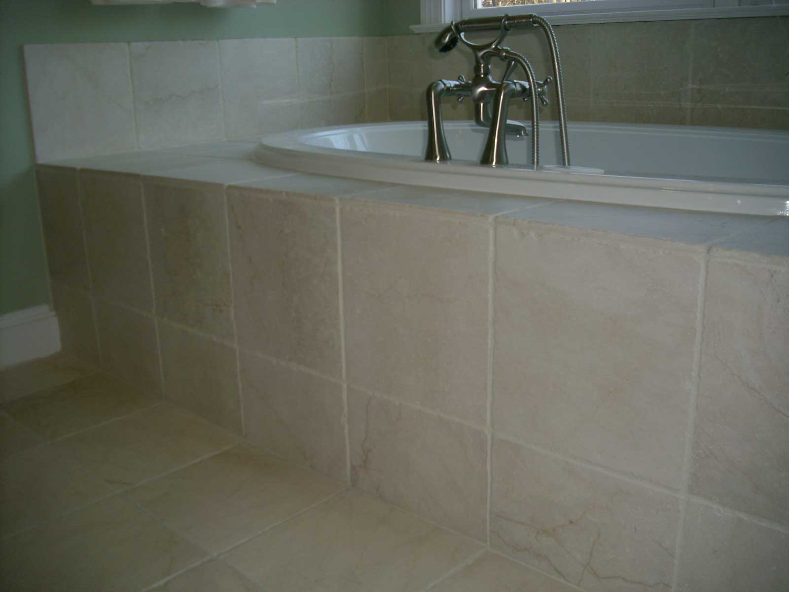 Tub and floor after grout restoration