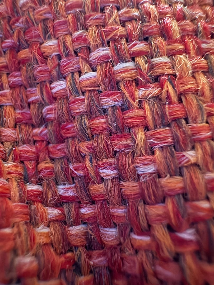 Close-up of hand-knotted Persian rug fibers