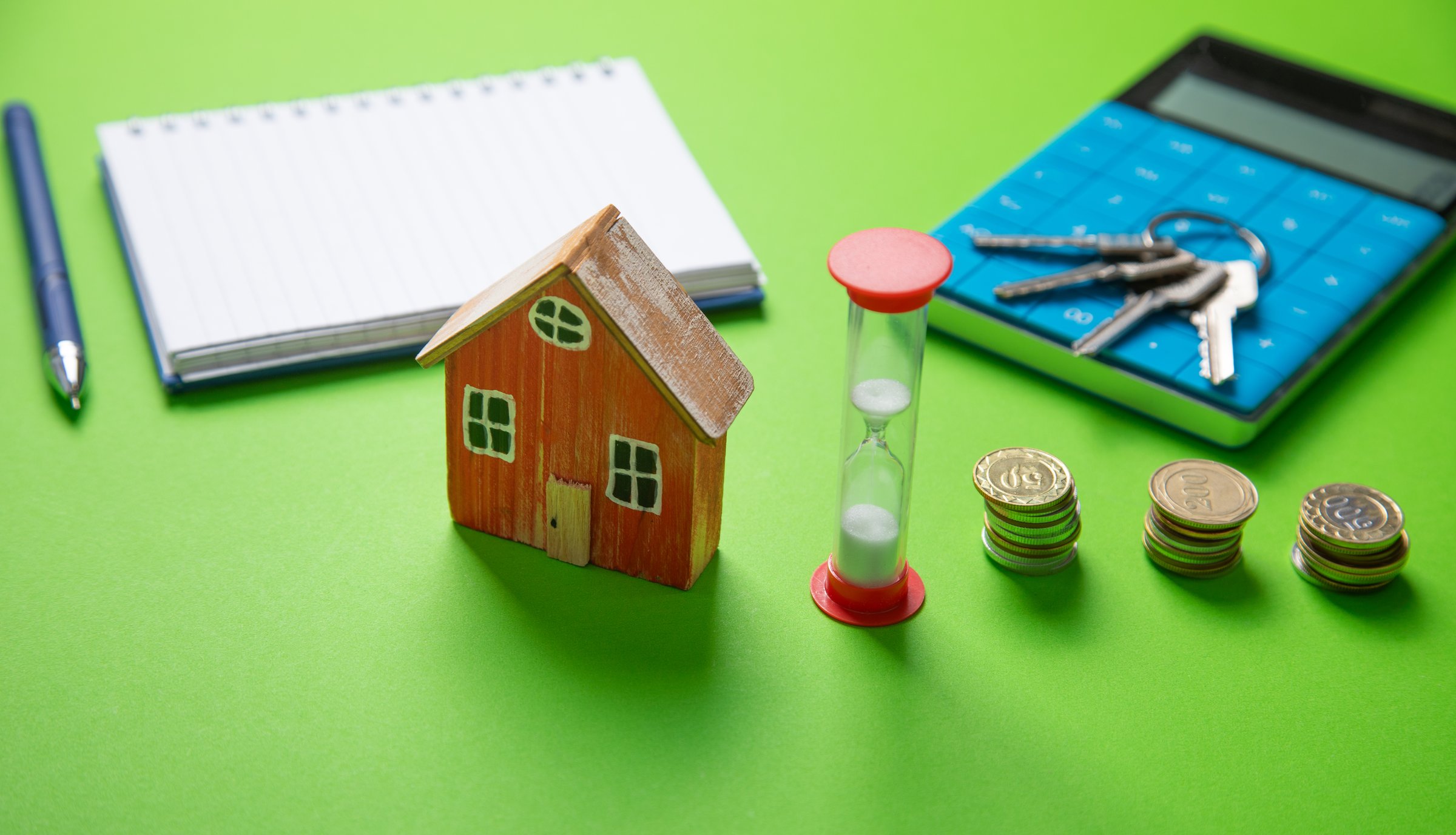 House model, coins, keys. Real estate