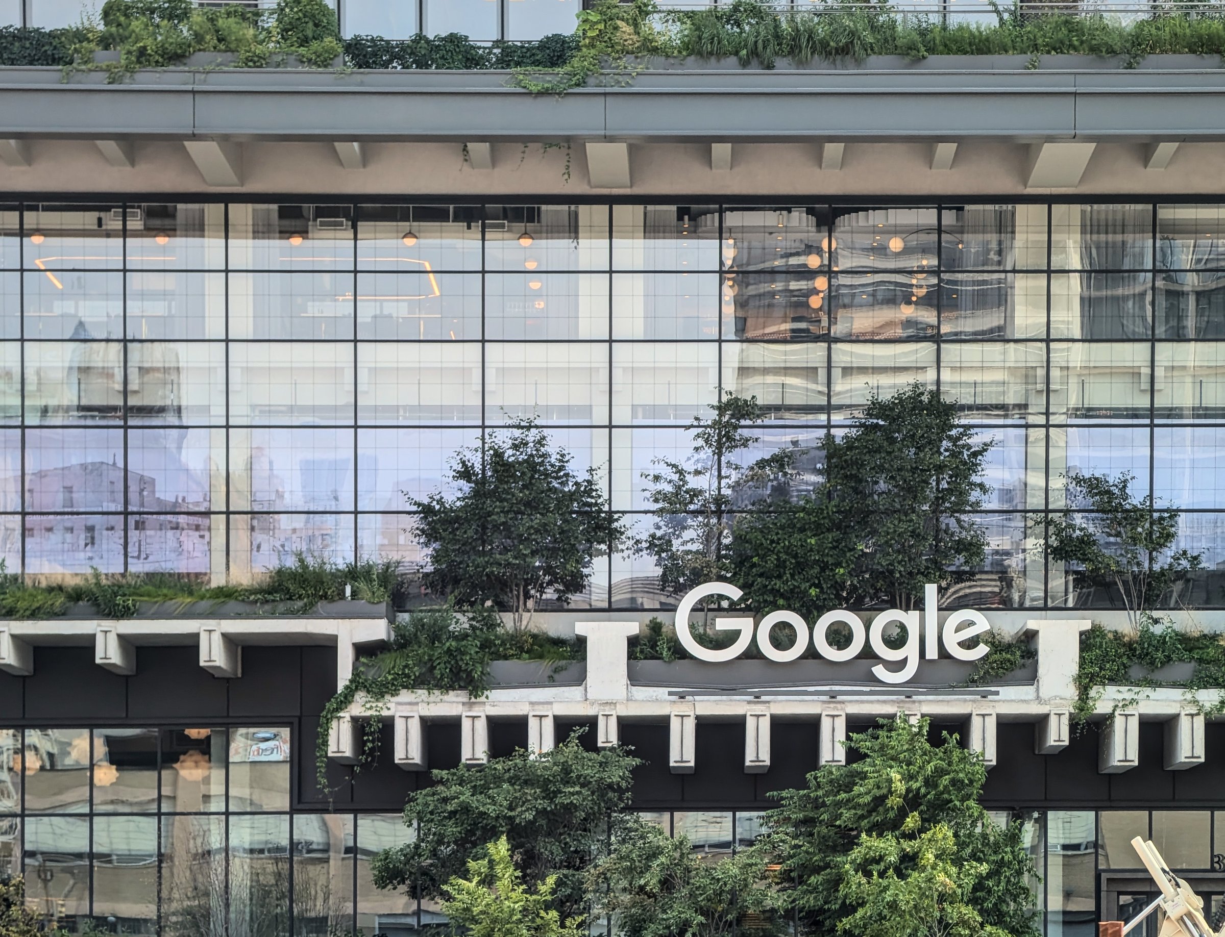 July 18, 2024: Google tech giant company logo on the front of new corporate headquarters building at St. John's Terminal, Houston street at Washington st, Manhattan, New York City.
