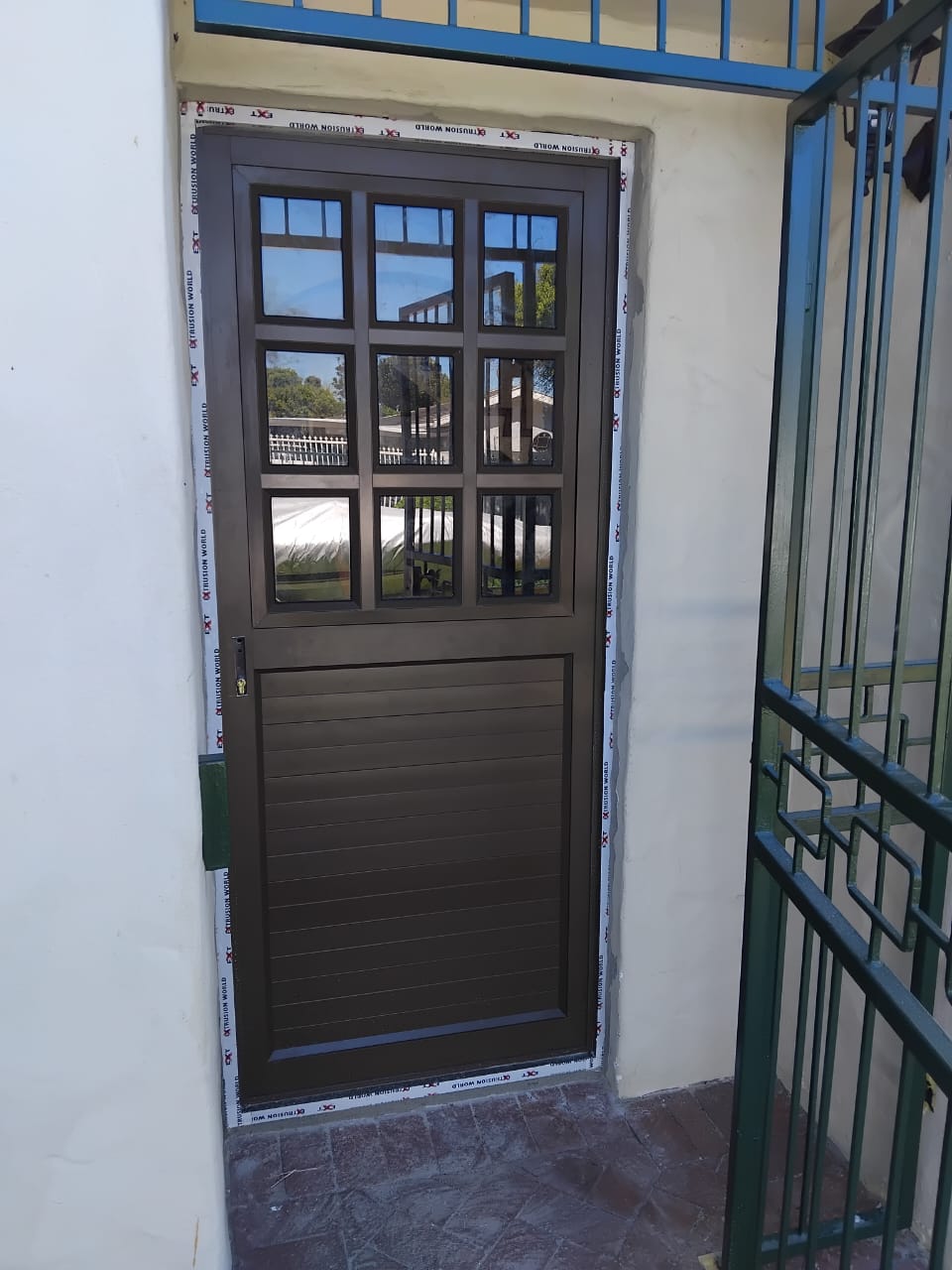 Premium hinged aluminium security front door installation