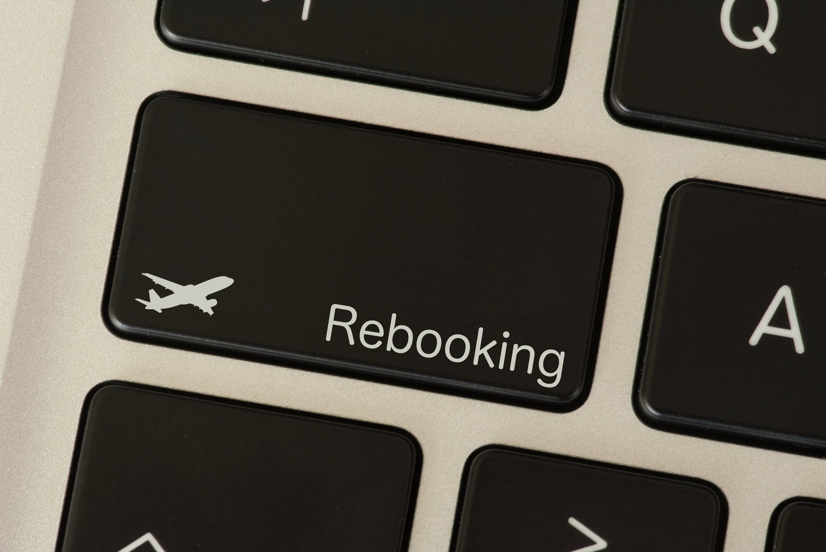A computer and button for rebooking a flight