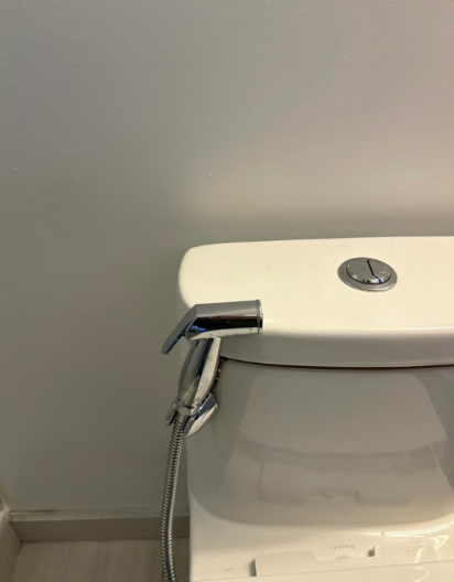 Plumber repairing sink