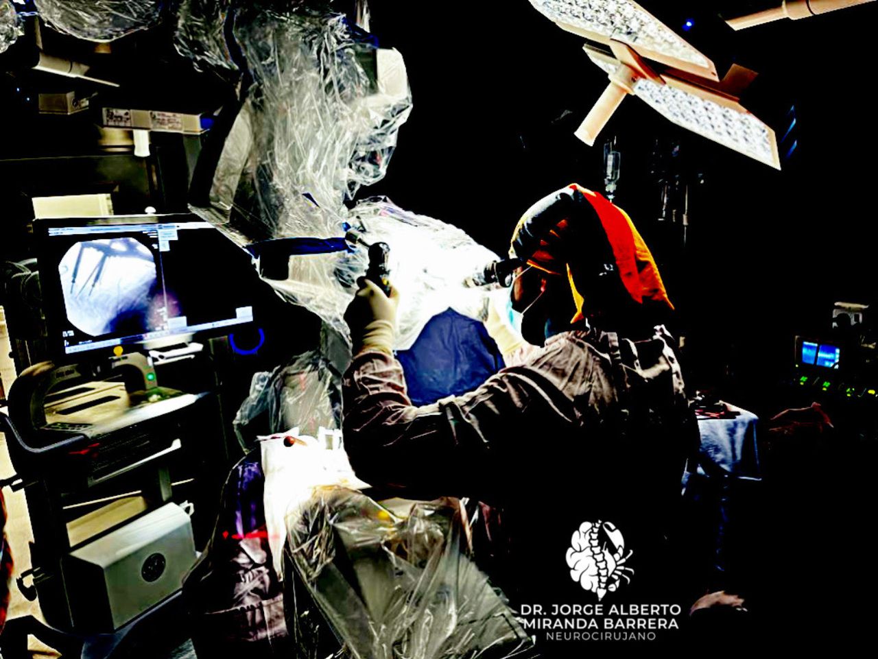 A cheerful male doctor engaged in a friendly discussion with a patient, conveying professionalism and care in a well-lit consultation room, emphasizing trust and communication in the medical field.