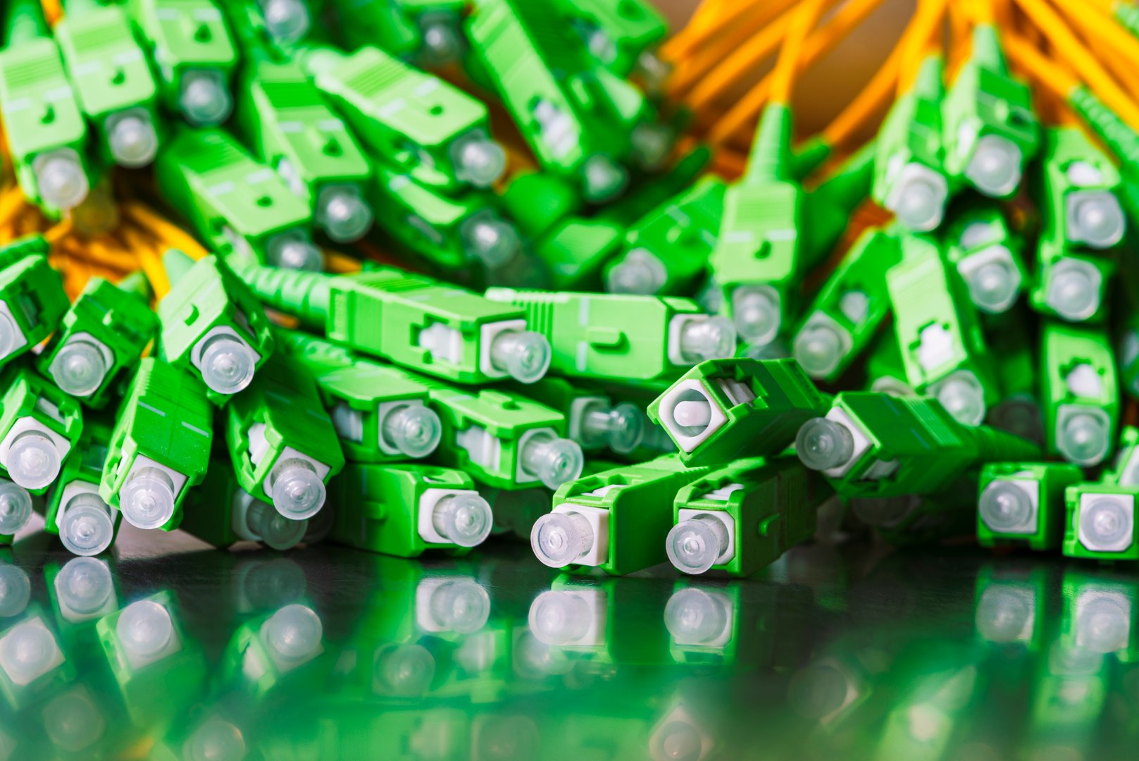 Bundle of SC/APC fiber optic patch cords used in FTTH networks.