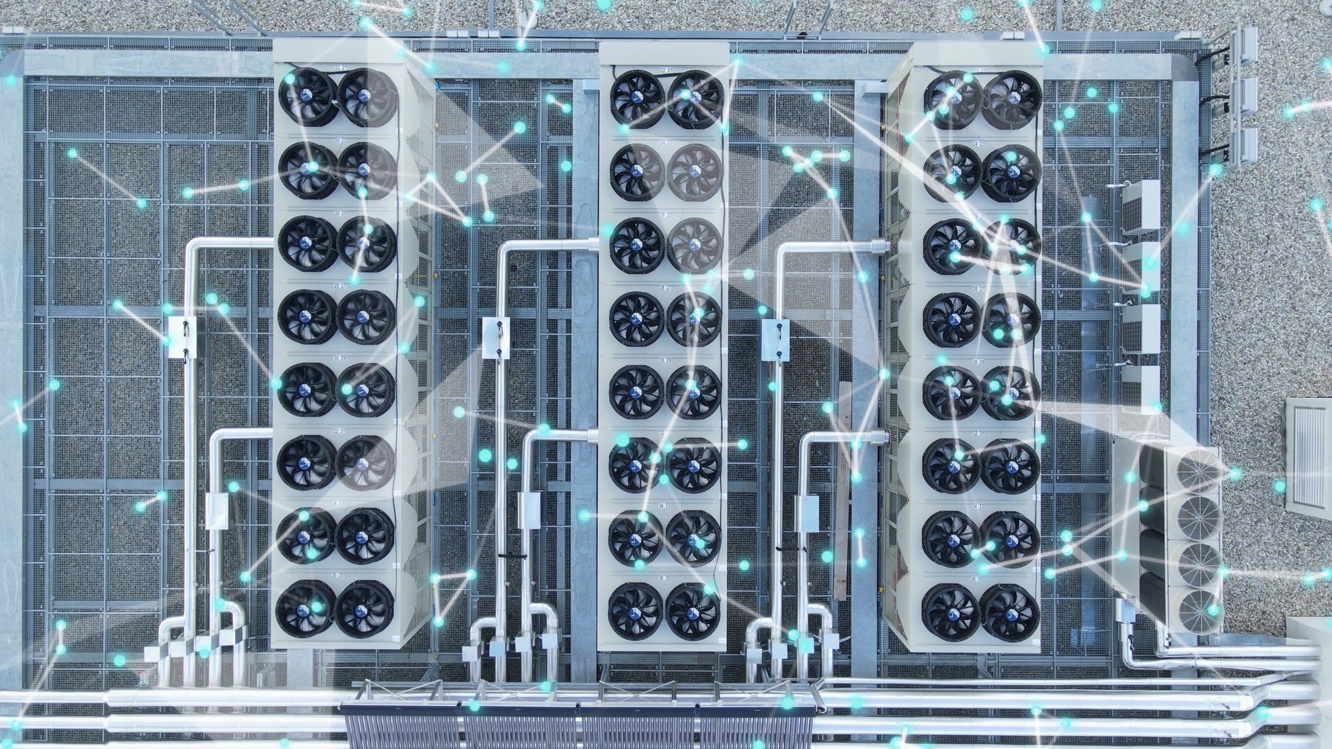 High-tech data center rooftop with ventilators and digital graphics overlay representing network connectivity