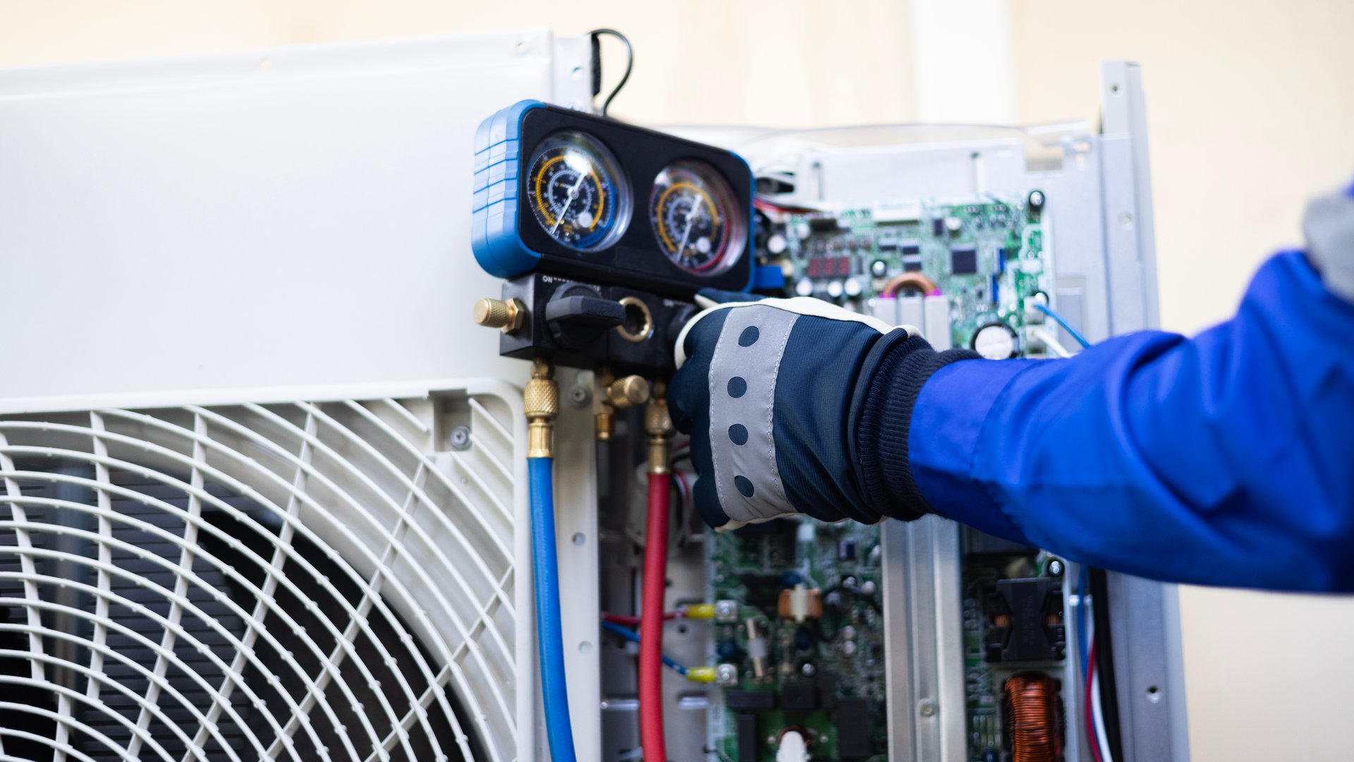 Close-up Air conditioner technician hand check  fill refrigerant liquid and maintenance condenser unit, Home care service