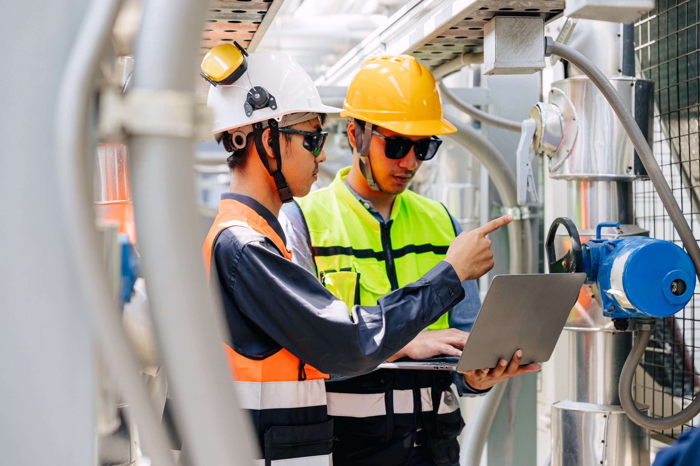 engineer man working with water pipe line in gas oil industry workplace