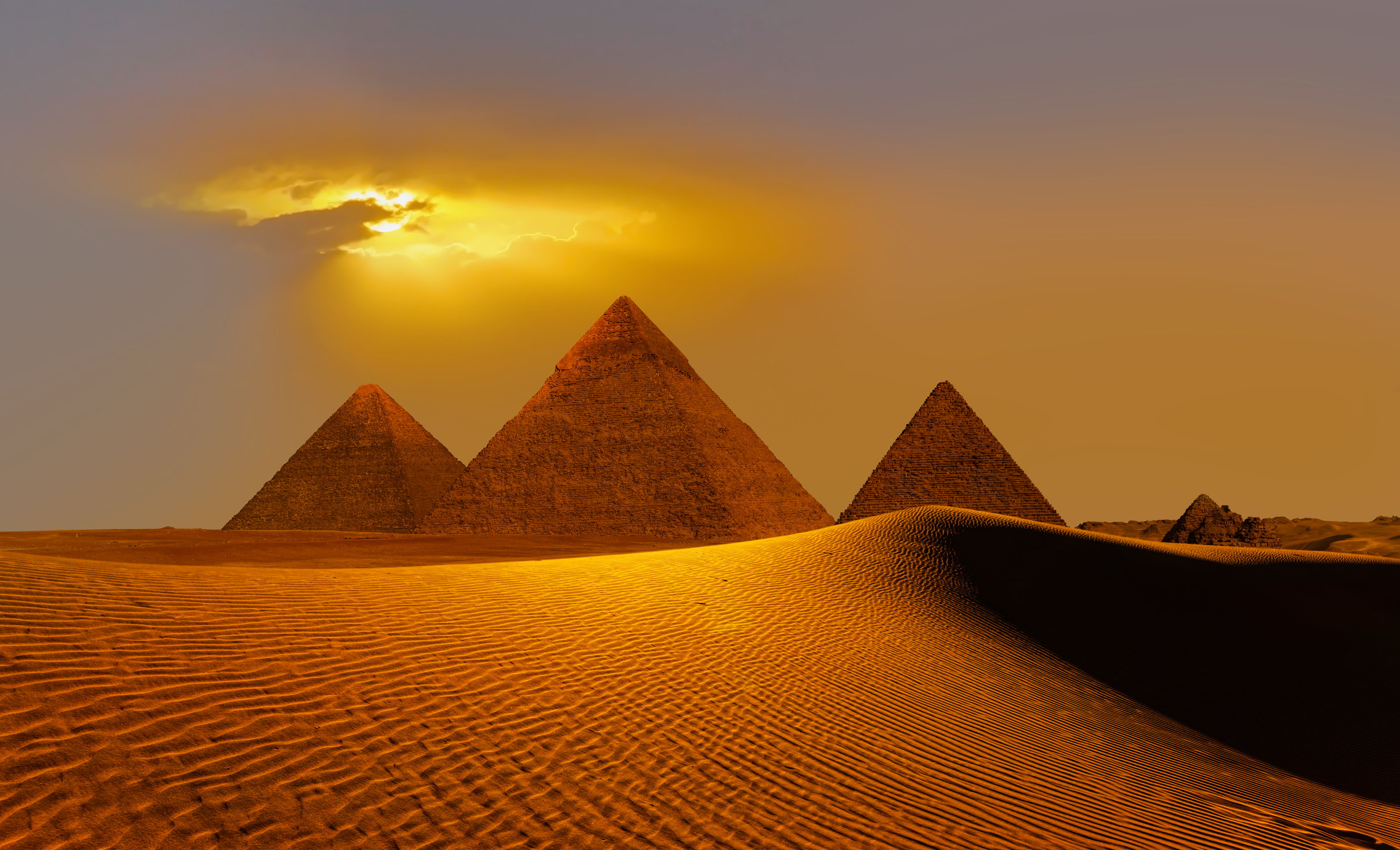 Eye of the god 'Ra' - Giza Pyramid Complex at amazing sunset - Cairo, Egypt