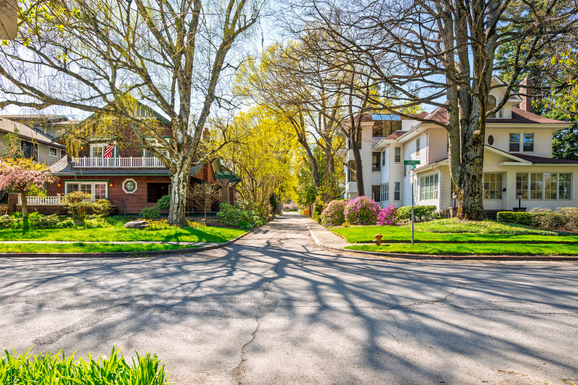 Picturesque tree lined streets at early Spring in the historic turn of the century Fort Grounds district along the lake in Coeur d'Alene, Idaho, USA, in the North Idaho Panhandle region.