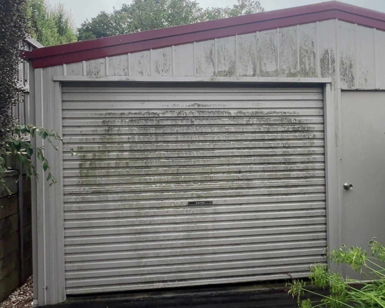 Dirty exterior wall before cleaning