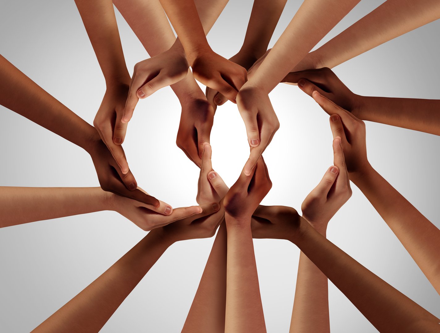 Business groups Unity and diversity partnership as hands in a group of 2 diverse people community connected together shaped as two support circles symbol of team or teamwork and togetherness.