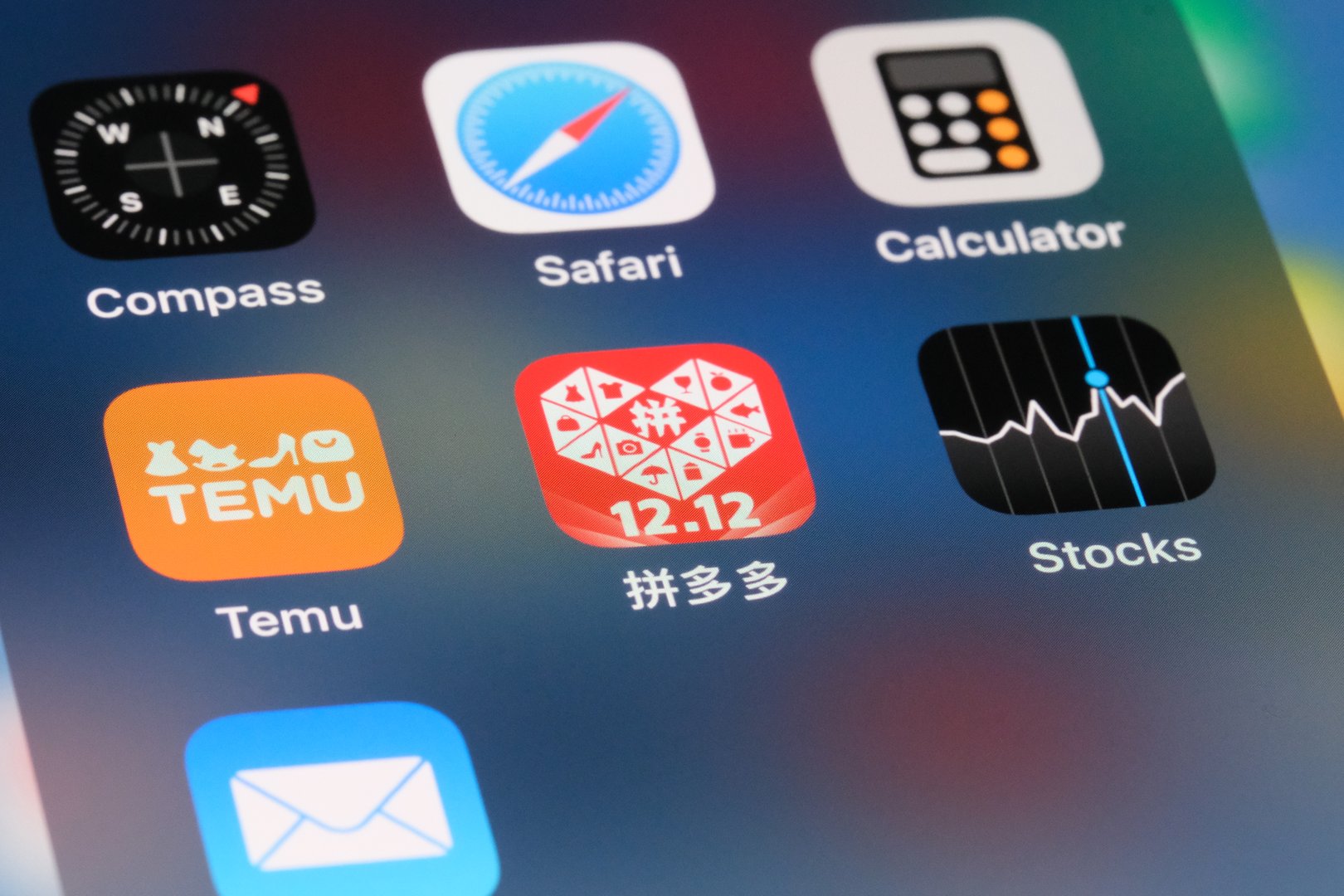 Shanghai,China-Dec.12 2023: Pinduoduo and Temu app icon logo. Both belong to Chinese e-commerce company PDD Holdings