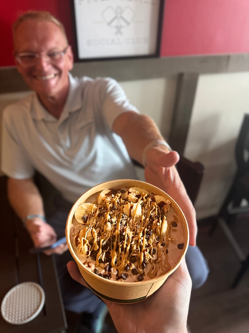 Ignite Nutrition team member with energizing drink