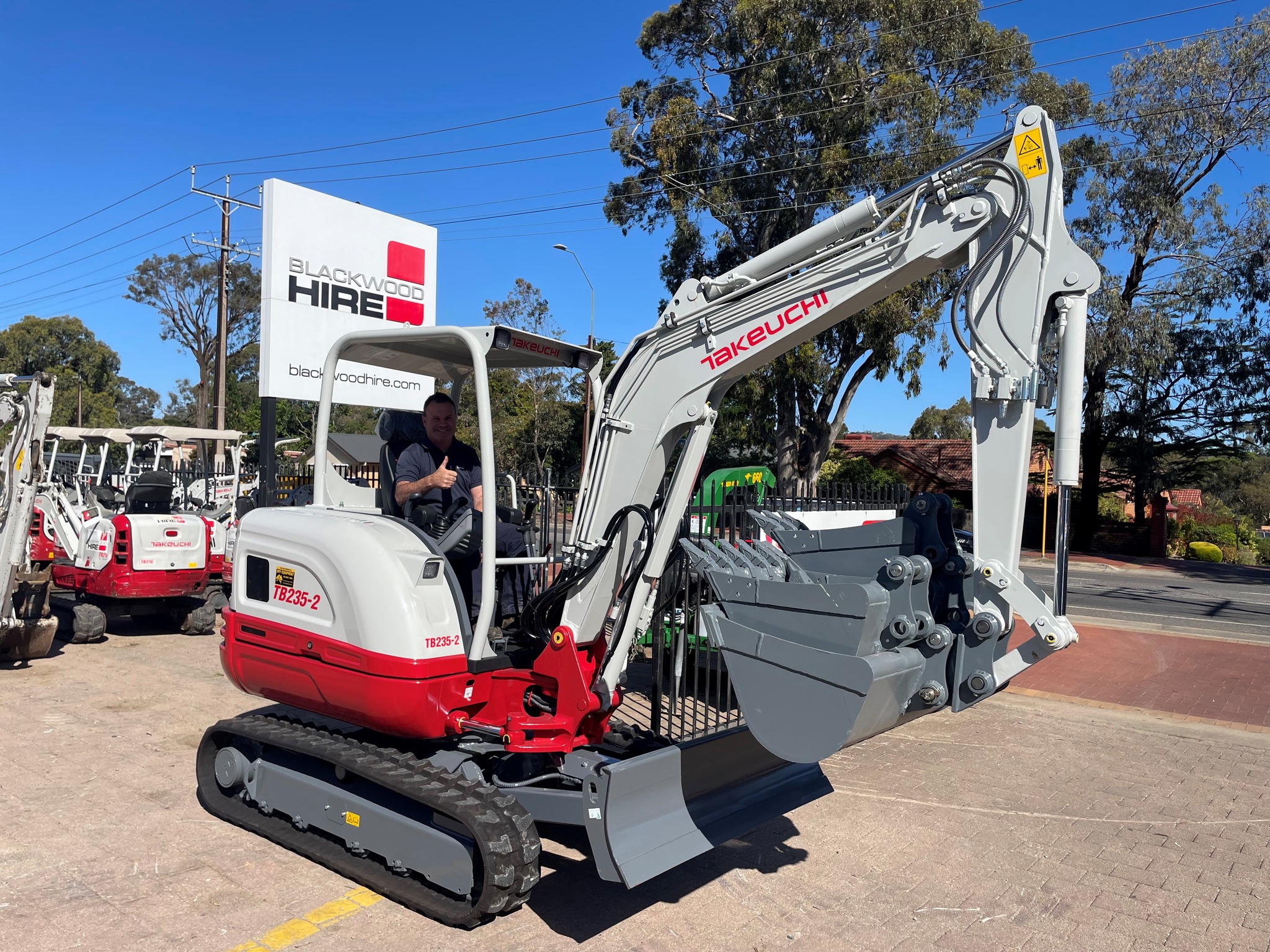 Takeuchi excavator machine at a construction site