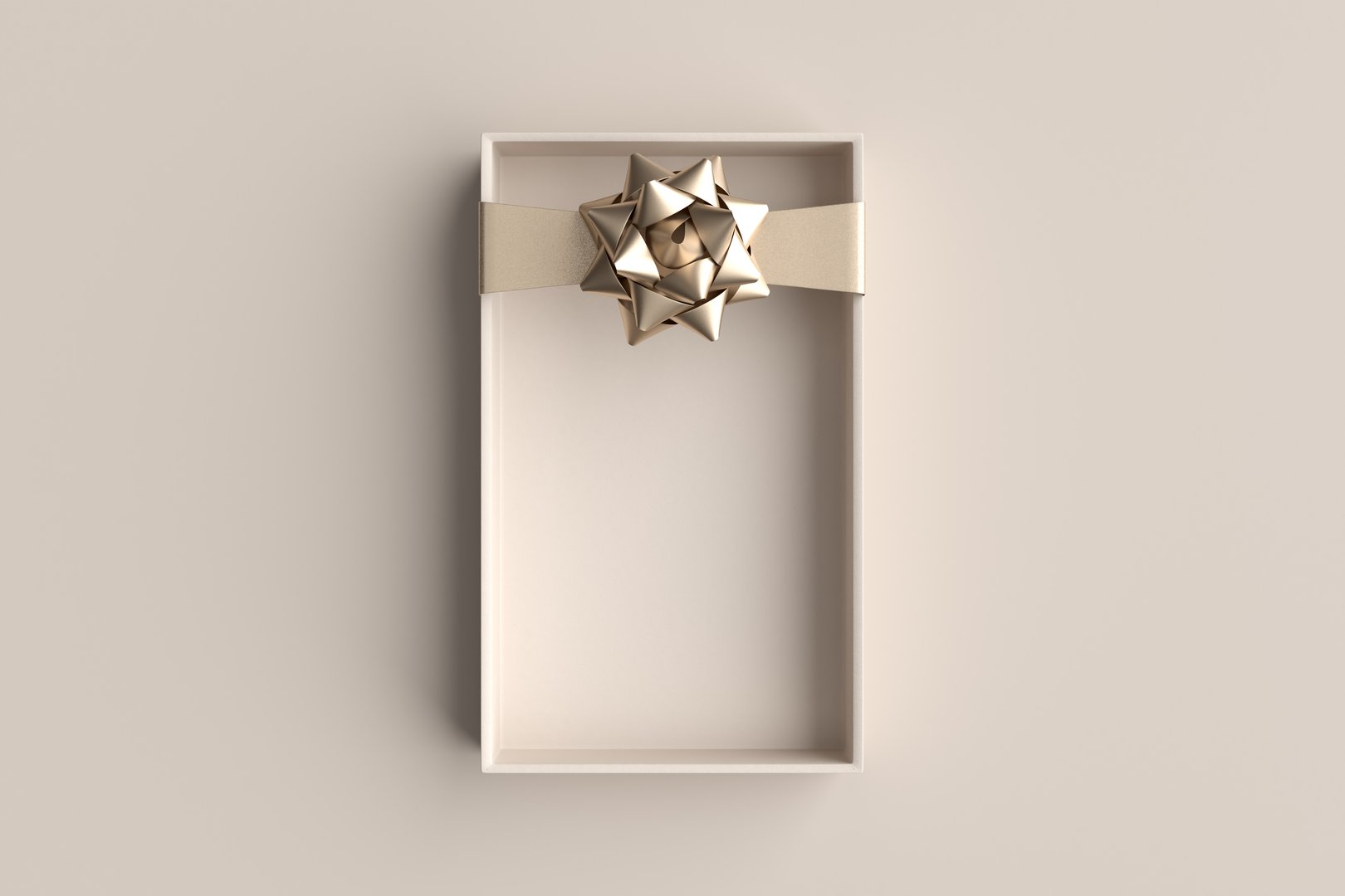 Minimal elegant open gift box with golden ribbon and bow on beige background, perfect for showcasing products or creating a festive atmosphere