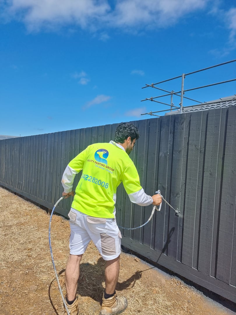 Quality Painting Group fence restoration completion phase - protective coating application November 2023