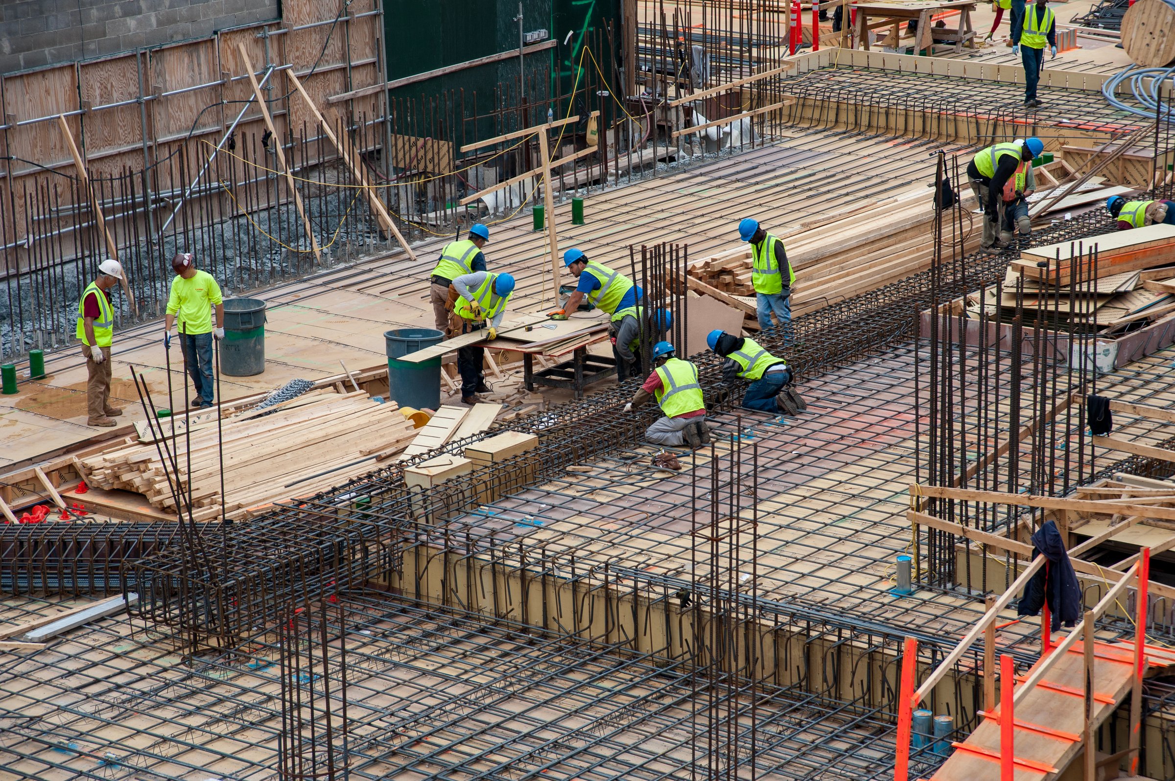 New York City, New York - May 18, 2015: Urban Scene Day, Construction Site Workers duing thair everyday hard job in New York City.