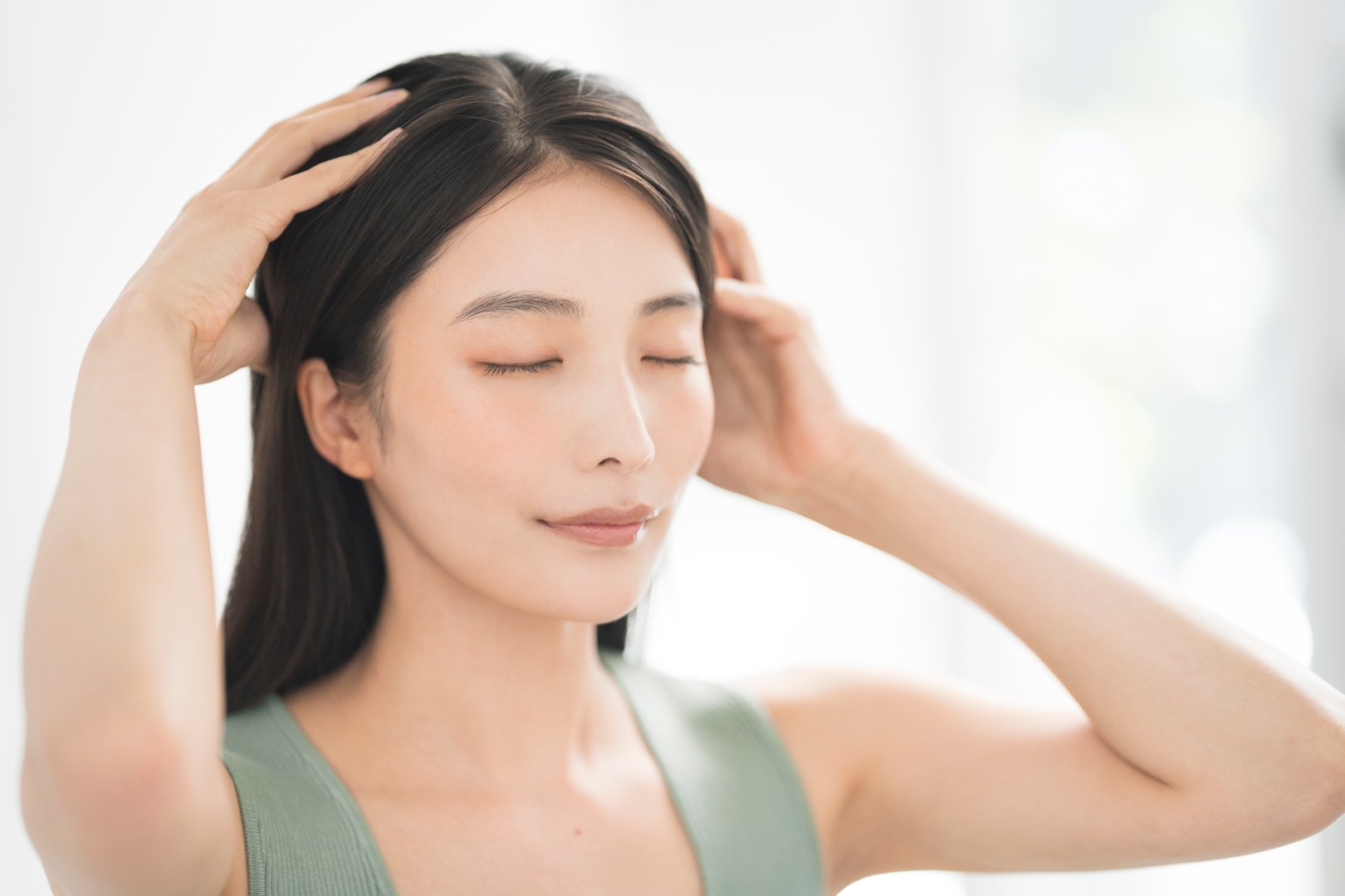 Portrait of a young dark-haired Japanese woman