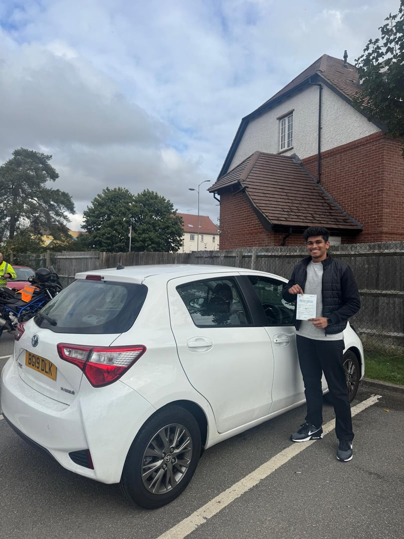 Successful driving test student with pass certificate