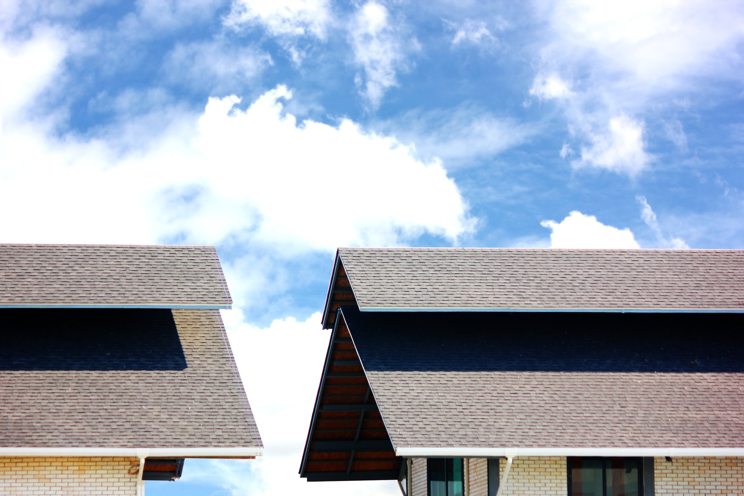 exterior double - layered roof on blue sky construction design