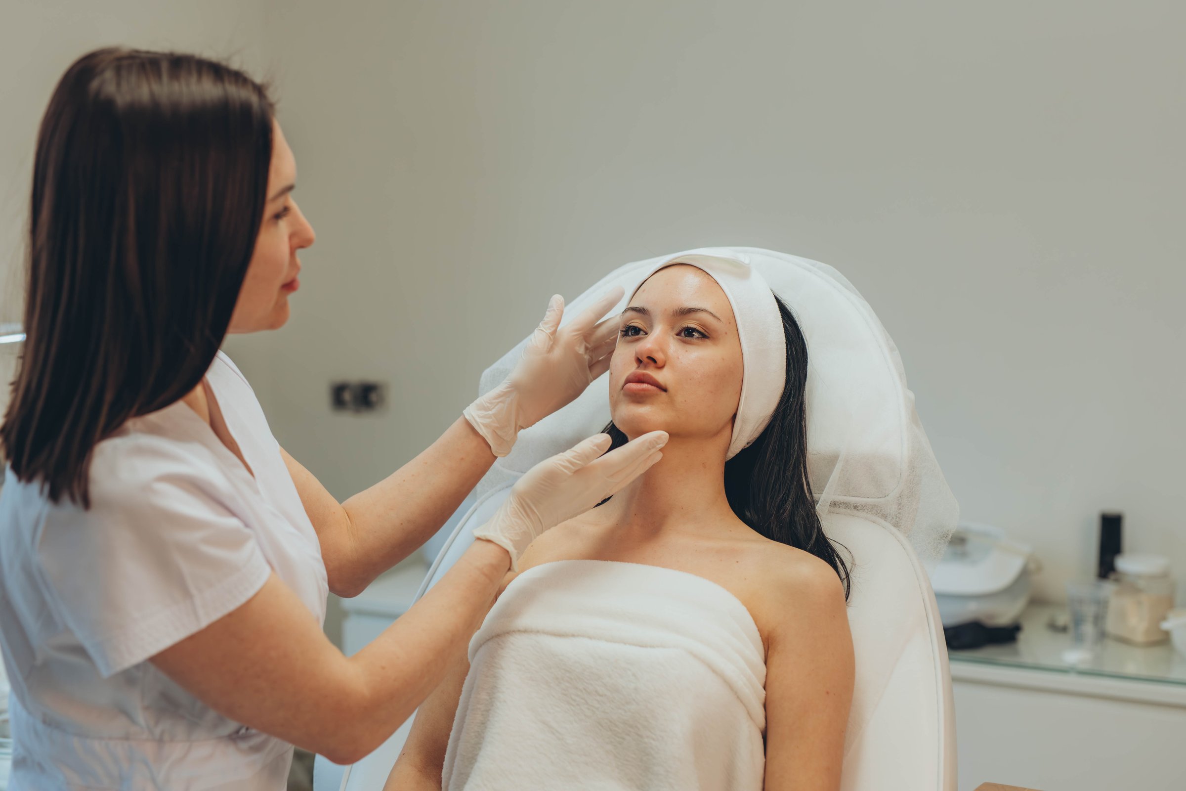 girl at a cosmetologist's office doing skin cleansing. High quality photo