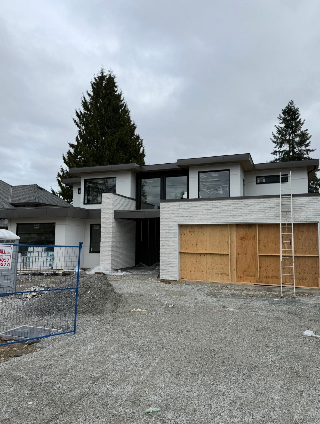 Coquitlam custom home with Hardie siding and shingles