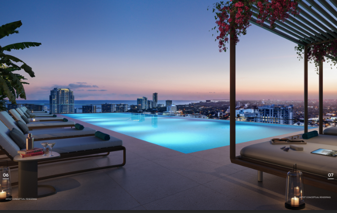 Rooftop infinity pool at sunset with lounge chairs and city skyline view, enhanced by soft lighting and plant decor.